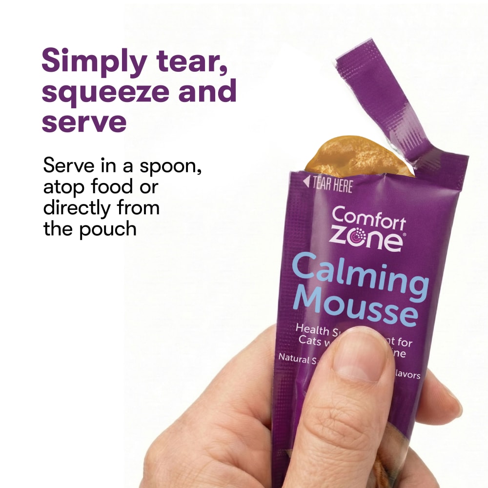 Opened Comfort Zone Cat Calming Mousse pouch demonstrating the easy tear, squeeze, and serve use